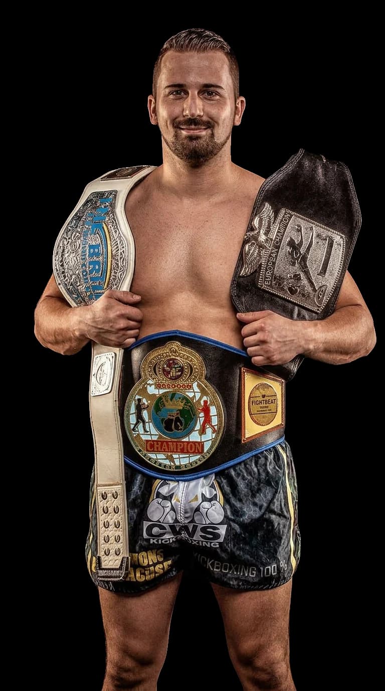 Amer Osmanhodzic with his kickboxing championship belts